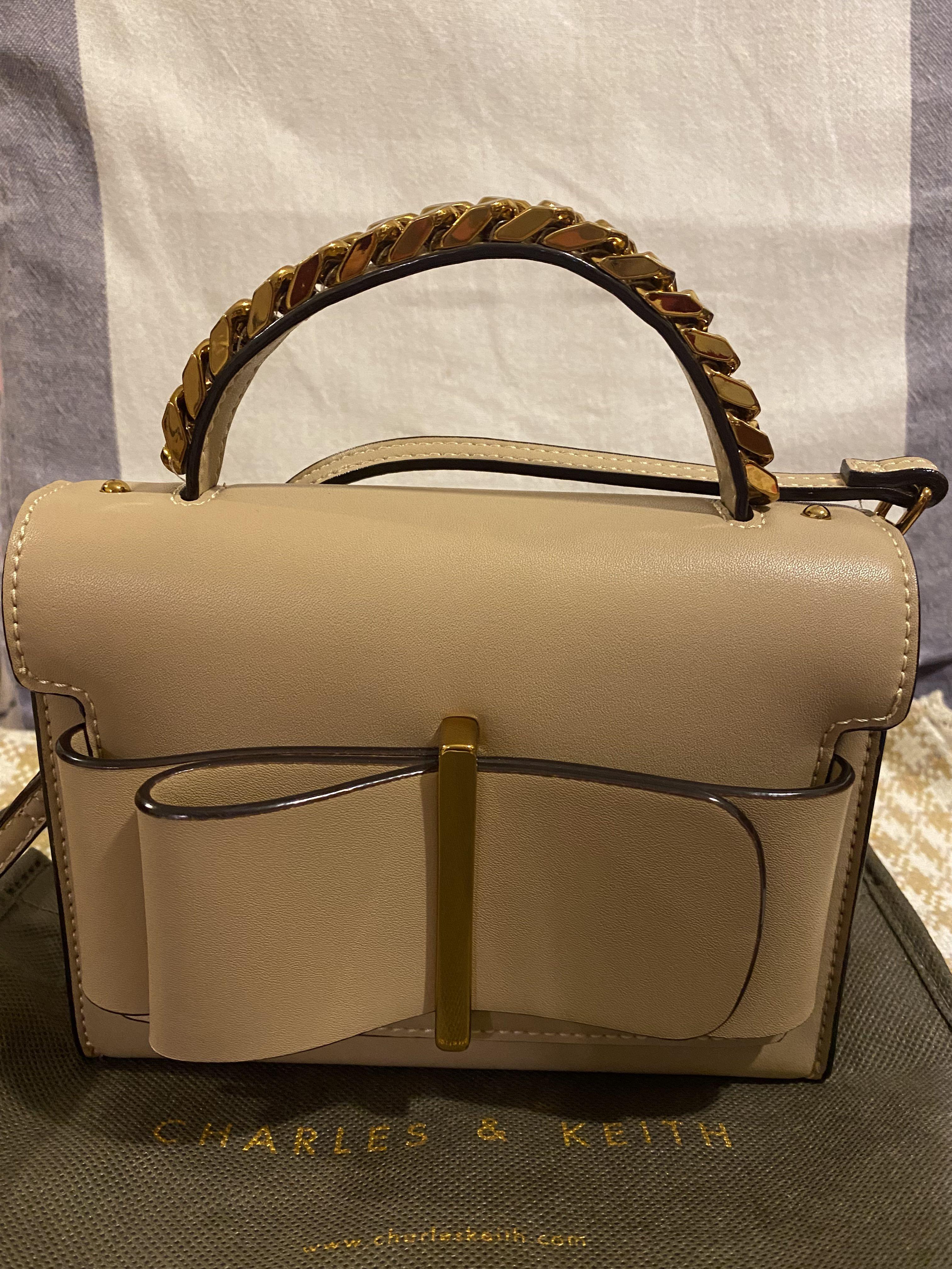 Chunky metal top handle bow flap bag sale
