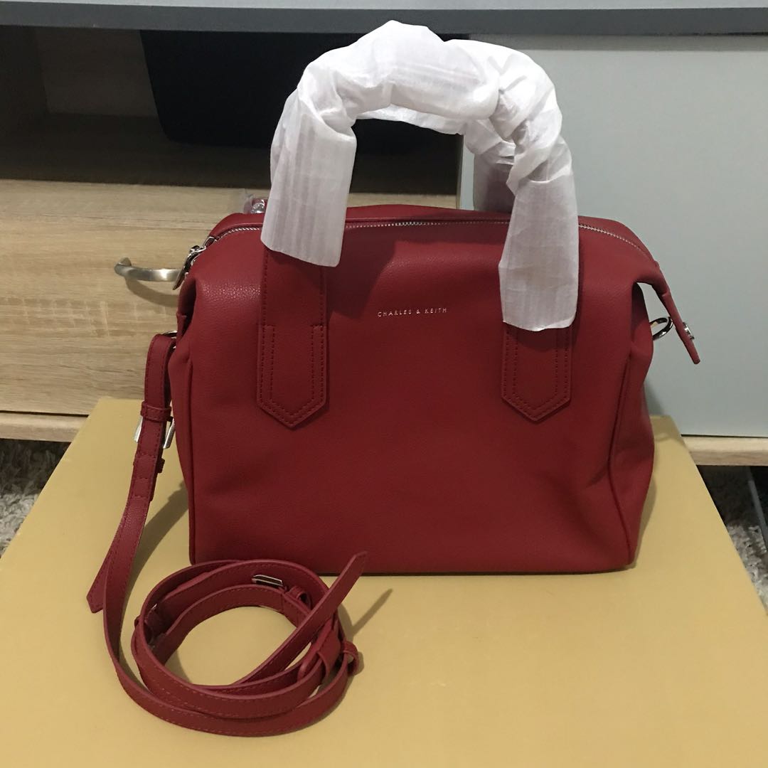 Charles and keith duffle bag deals