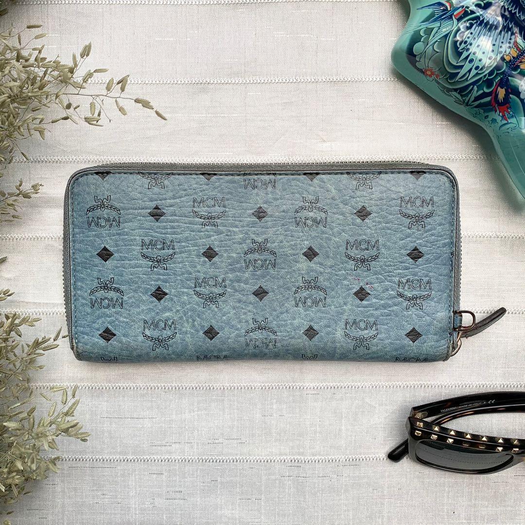 MCM Visetos Long Zippy Wallet (Category: Luxury Bags & Wallets) located in Floridablanca. Submitted by lj_domasian (Listing ID 1144581851, Image 3). Description: Original! MCM Visetos Long Zippy Wallet P3500 Inclusions: None 𝑪𝒐𝒏𝒅𝒊𝒕𝒊𝒐𝒏: 9/10 ⬇️ 𝗘𝘅𝘁𝗲𝗿𝗶𝗼𝗿: Metal plate have sctaches and minor tarnish on its sides. The cloth on the zipper is dirty too as shown in the photo. 𝗜𝗻𝘁𝗲𝗿𝗶𝗼𝗿: No flaws..