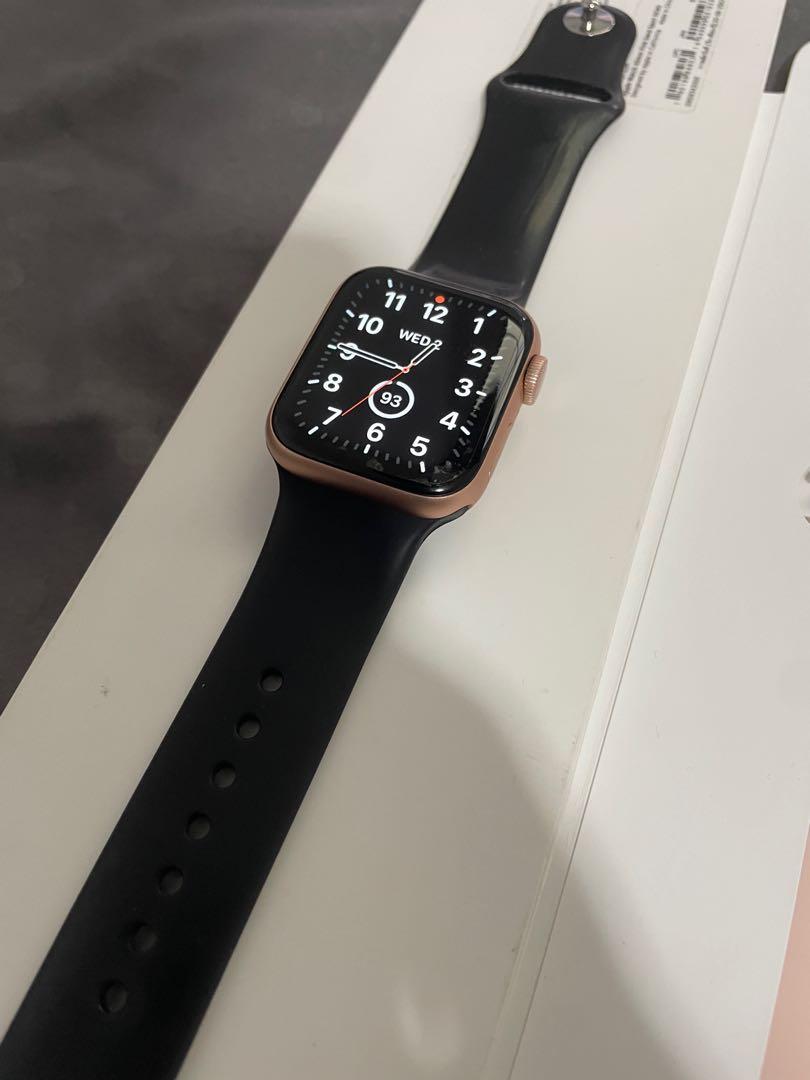 Gold aluminum apple watch with black band sale