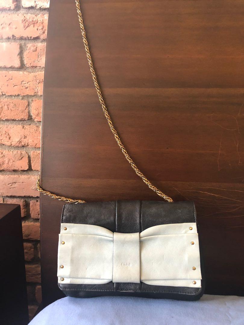 Authentic Chloé June bag with chain sling (Category: Luxury Bags & Wallets) located in Las Pinas. Submitted by jaydeeclutters (Listing ID 1141184461, Image 2). Description: With normal signs of use but still very pretty. Price still negotiable Hologram and serial number still attached Can be worn as a cross body bag or Can be used as a clutch too Daytime to night time bag .