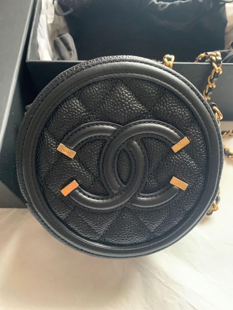 Chanel cc filigree round chain clutch top