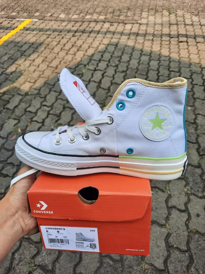 white converse with rainbow