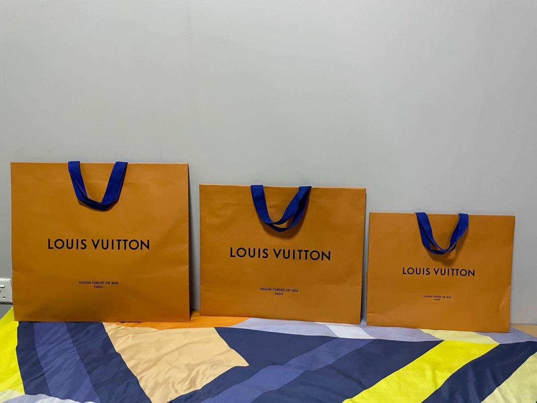 Authentic LV paper shopping bag , 23inches and 18 inches .