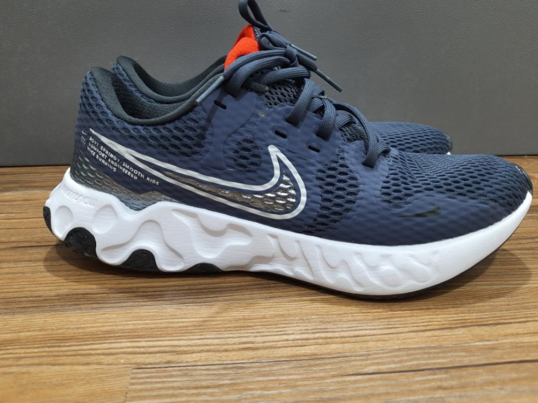Navy blue and orange nikes sales