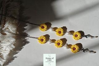 Sunflower. houseofcjd (Handmade polymer clay mask/eyeglass lanyard)