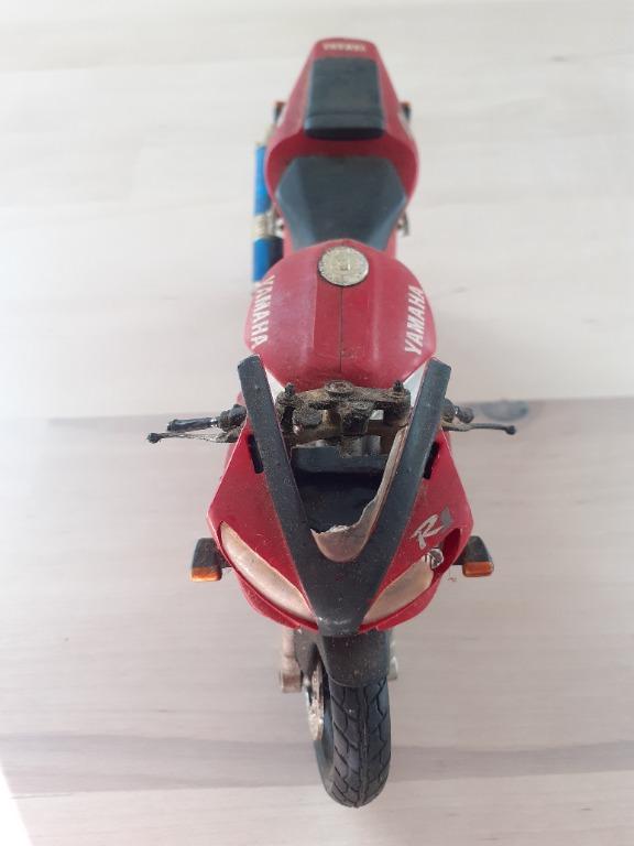 Yamaha YZF R1 Figurine (Category: Vehicle & Diecast Models) located in Paranaque City. Submitted by donjuan_thegreat (Listing ID 1144813566, Image 3). Description: Item in very good vintage condition Broken windshield and light as seen in pics Handle has damage Purchased in Paris Material: Dimensions: W 6 cm H 9.5 cm L 17 cm For pick-up in UPS 5 Paranaque or can ship at buyers expense.