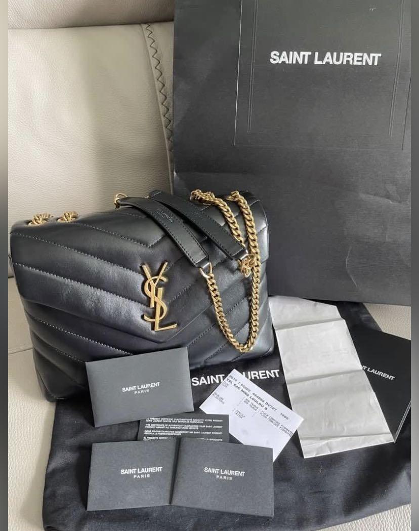 Fake ysl hotsell clutch bag