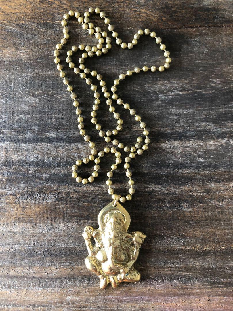 Brass Ganesh Pendant with Brass ball chain (Category: Necklaces) located in Muntinlupa City. Submitted by declutter_with_me (Listing ID 1144871453, Image 1). Description: OM Brass pendant with Brass Ball chain Length of chain about 26”.