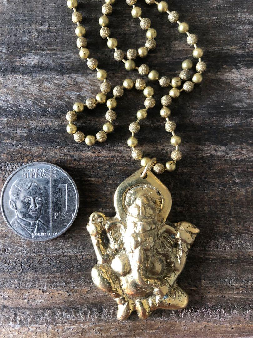 Brass Ganesh Pendant with Brass ball chain (Category: Necklaces) located in Muntinlupa City. Submitted by declutter_with_me (Listing ID 1144871453, Image 2). Description: OM Brass pendant with Brass Ball chain Length of chain about 26”.