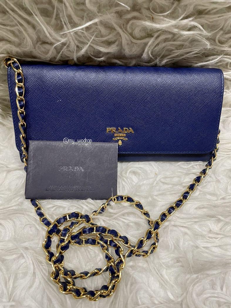 Prada Safianno Leather (WOC) in Navy Blue, Luxury, Bags & Wallets on  Carousell