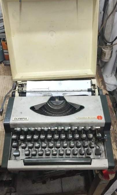 F/S: Olympia Traveller De Luxe Typewriter (Category: Office & Business Technology) located in Bacoor. Submitted by piolo16 (Listing ID 1145167126, Image 1). Description: For Sale: Olympia Traveller De Luxe Typewriter (Vintage) All Keys are Working ✅ Ready to Used ✅ Ink/Ribbon: Black ✅ Cover ✅ Bacoor Area ✅ Cash on Delivery / Pickup ✅ Gcash / Bank Account ✅ LBC Express Cash on Pickup✅.
