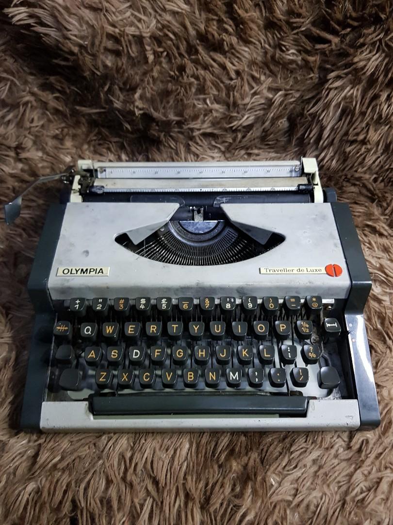 F/S: Olympia Traveller De Luxe Typewriter (Category: Office & Business Technology) located in Bacoor. Submitted by piolo16 (Listing ID 1145167126, Image 2). Description: For Sale: Olympia Traveller De Luxe Typewriter (Vintage) All Keys are Working ✅ Ready to Used ✅ Ink/Ribbon: Black ✅ Cover ✅ Bacoor Area ✅ Cash on Delivery / Pickup ✅ Gcash / Bank Account ✅ LBC Express Cash on Pickup✅.