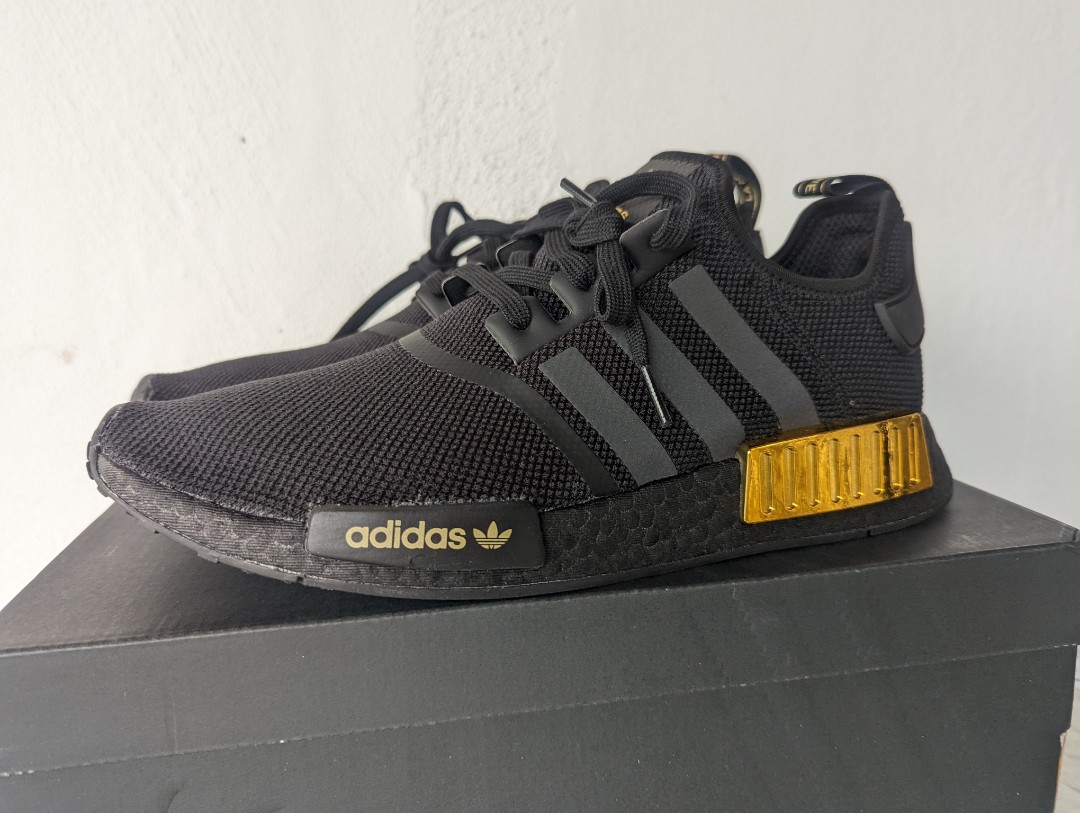 Adidas nmd black gold hot sale