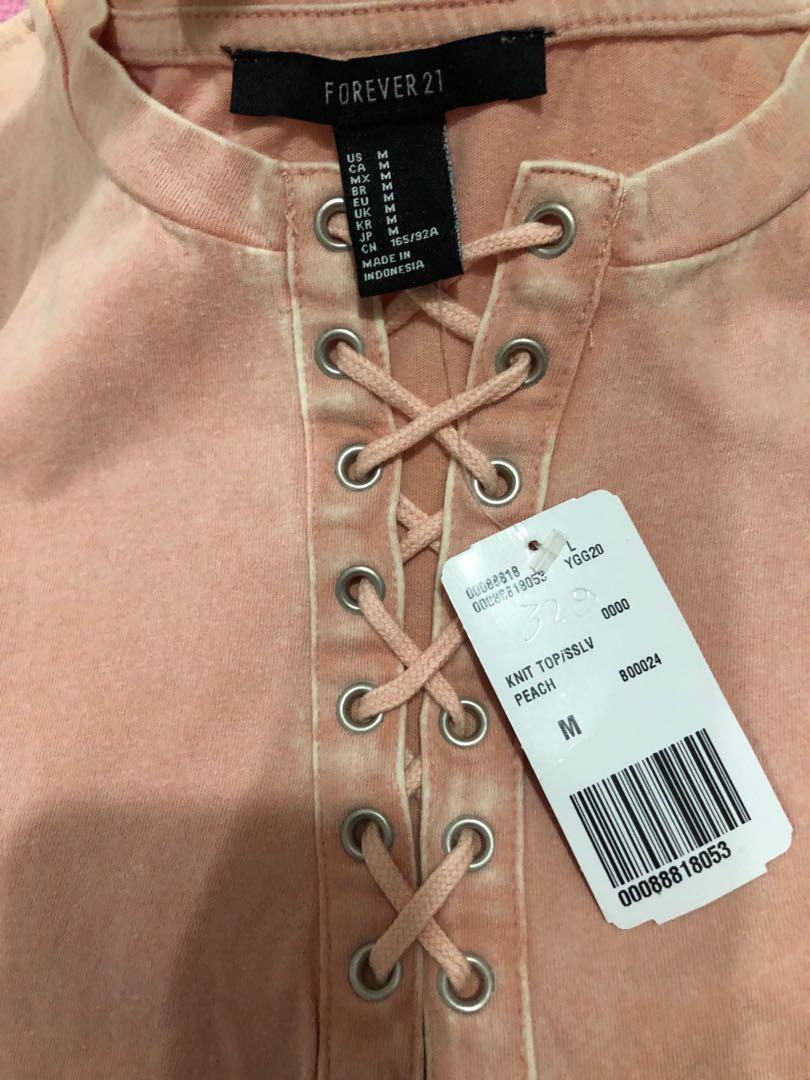 Original Forever 21 shirt (Category: Shirts) located in Marilao. Submitted by agonold (Listing ID 1145138047, Image 3). Description: Original Forever 21 shirt Size medium Brand new Original price php655 RFS: Decluttering.