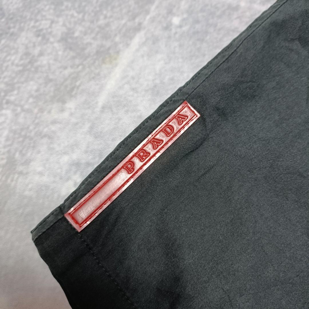 Prada shop rubber logo