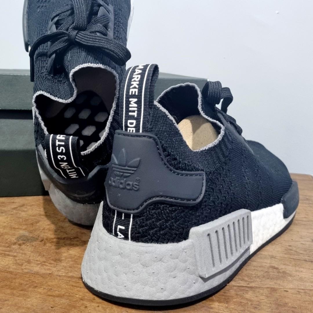Nmd black on sale flyknit