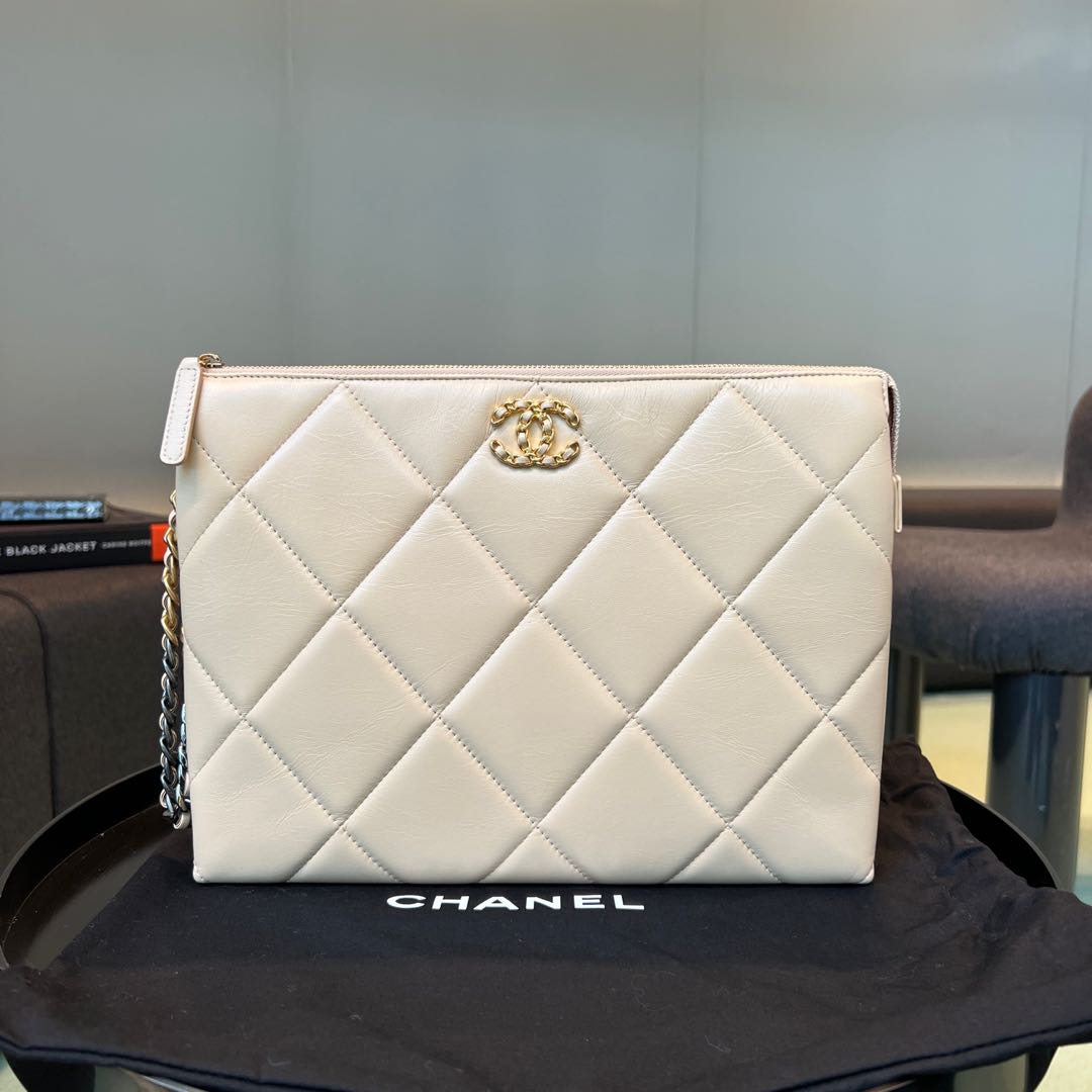 Chanel 19 Wristlet clutch, Luxury, Bags & Wallets on Carousell