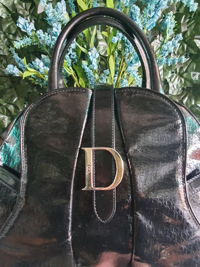Dior bowler sadle bag (Category: Luxury Bags & Wallets) located in Manila. Submitted by silentflower.28d9ae (Listing ID 1145321409, Image 2). Description: vintage monogram dior black leather bag. garanteed orig moneyback if proven fake..