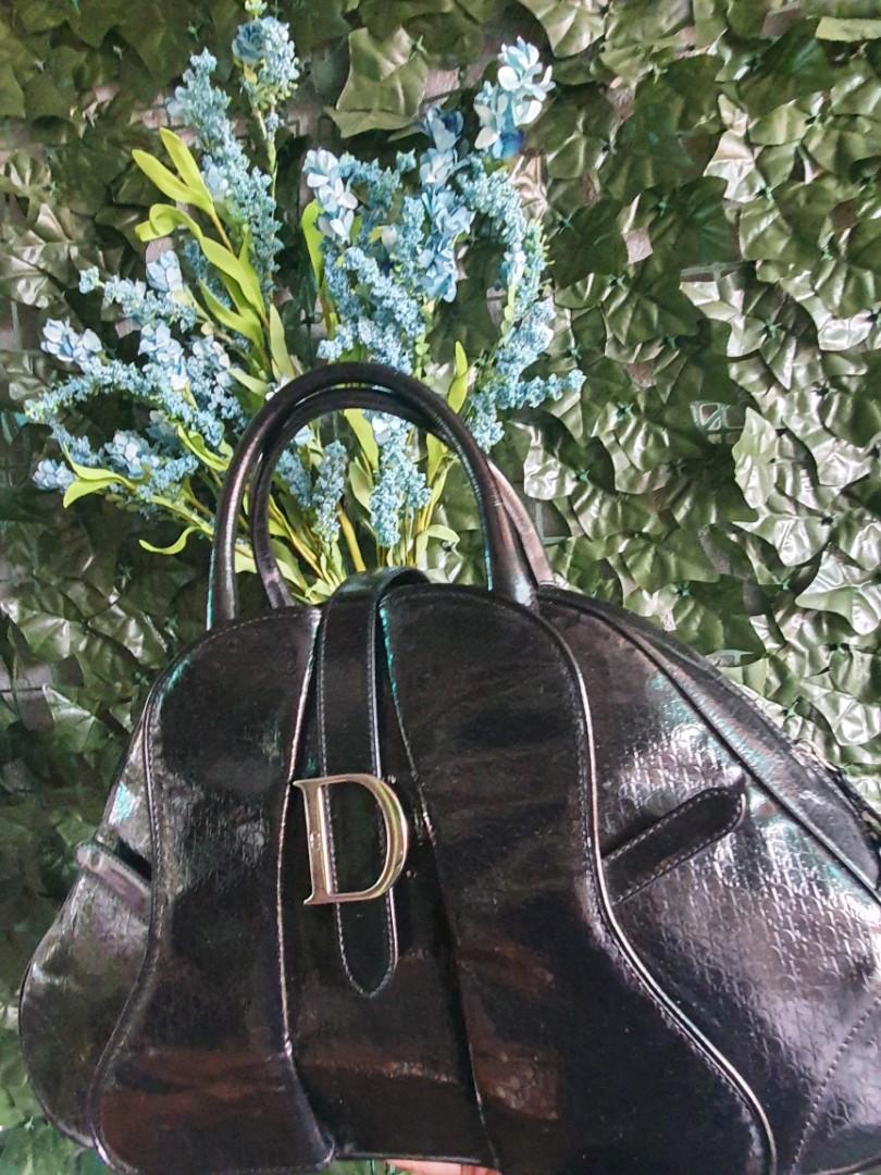 Dior bowler sadle bag (Category: Luxury Bags & Wallets) located in Manila. Submitted by silentflower.28d9ae (Listing ID 1145321409, Image 1). Description: vintage monogram dior black leather bag. garanteed orig moneyback if proven fake..