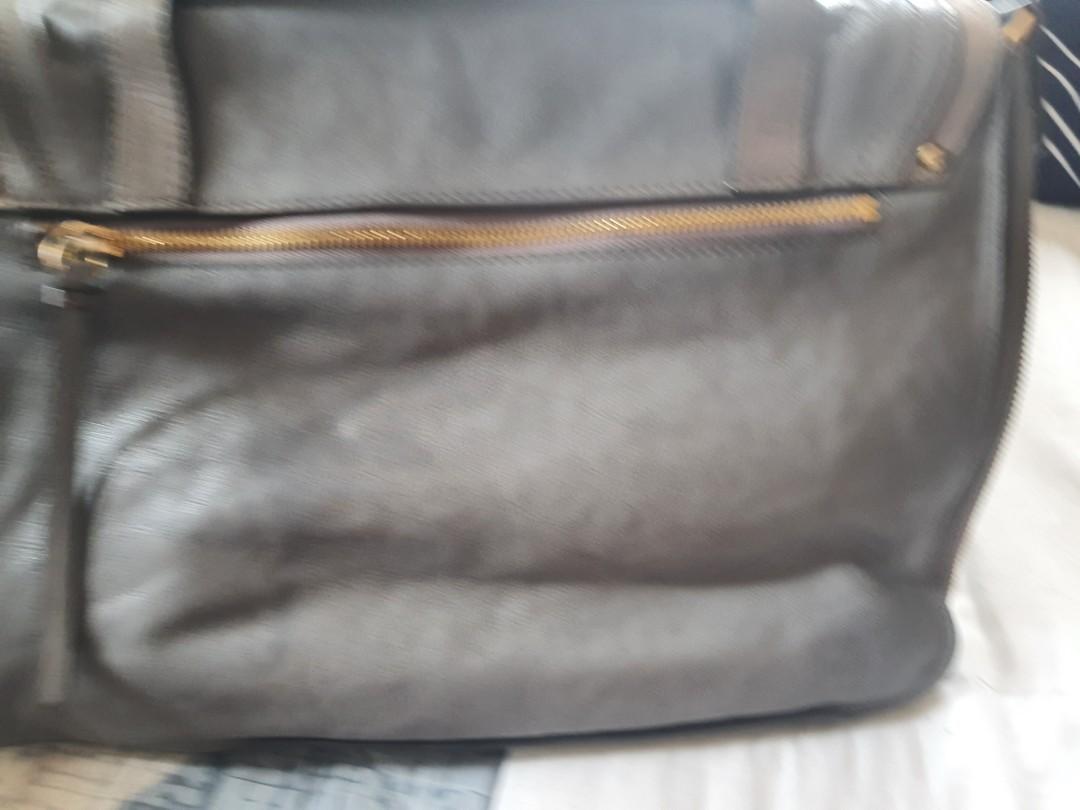 Jill Stuart 2 way sling Bag (Category: Luxury Bags & Wallets) located in Manila. Submitted by bag_collections (Listing ID 1145291219, Image 2). Description: selling my personal preloved Jill Stuart 2 way bag Color:Gray With minimal visible signs if usage(kindly refer to the pics) Can also be used as Laptop Bag.