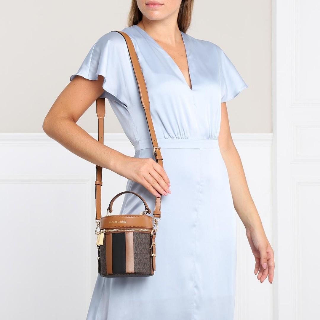 MK Michael Kors Barrel Travel Crossbody bag, Women's Fashion, Bags &  Wallets, Purses & Pouches on Carousell