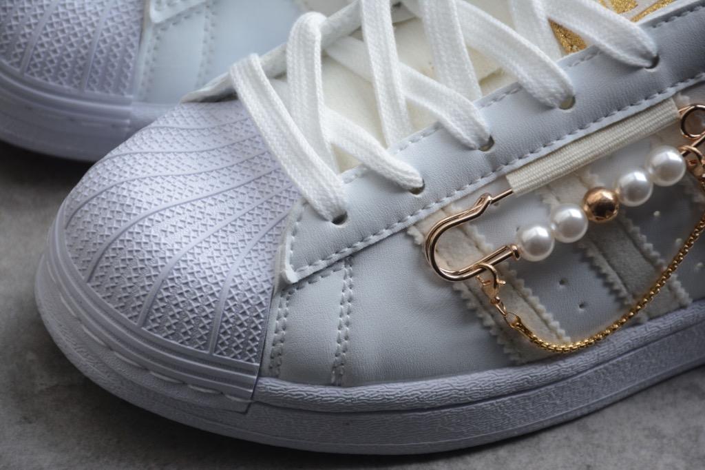 Superstar store bianche borchie