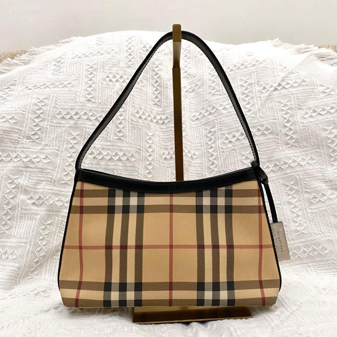Burberry Nova Check Canvas Pochette Handbag, Women's Fashion, Bags &  Wallets, Purses & Pouches on Carousell