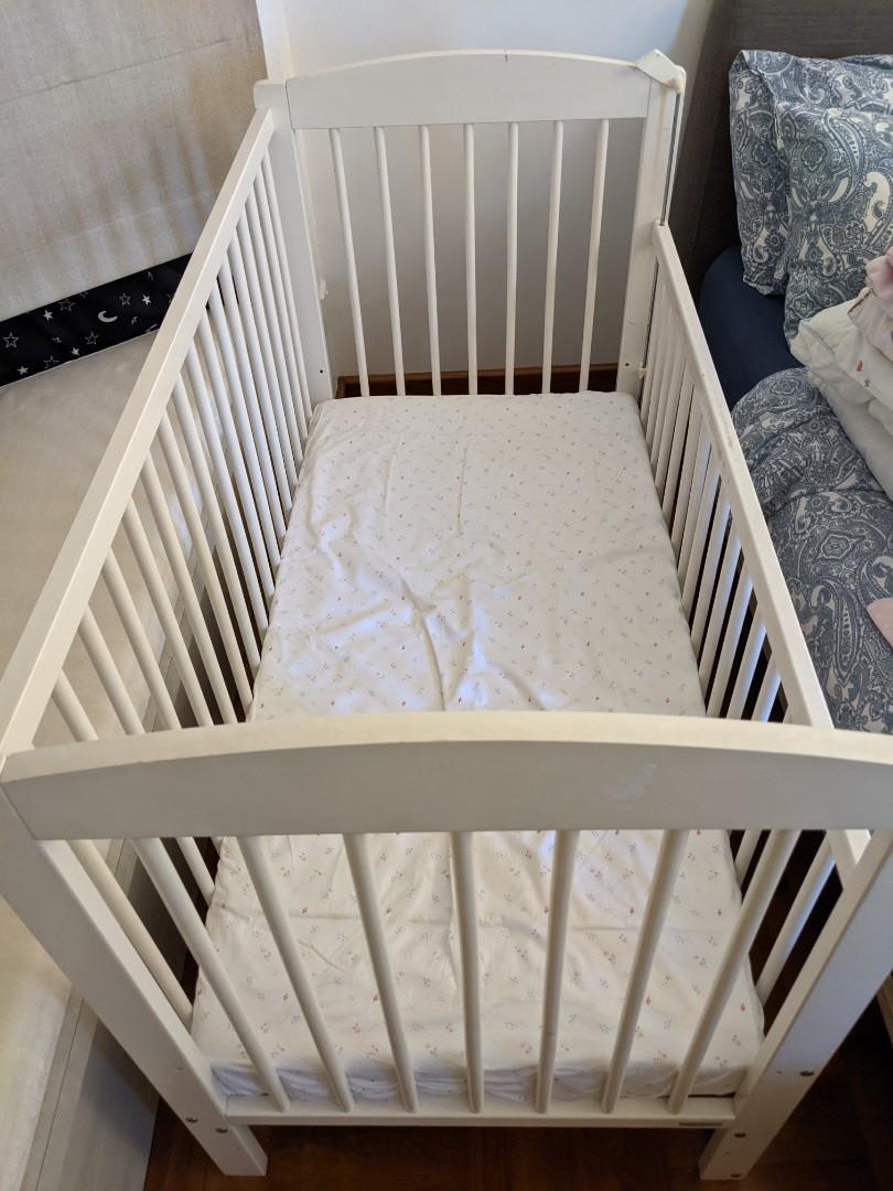 Baby cot with sliding side, Babies & Kids, Baby Nursery & Kids Furniture, Cots & Cribs on Carousell