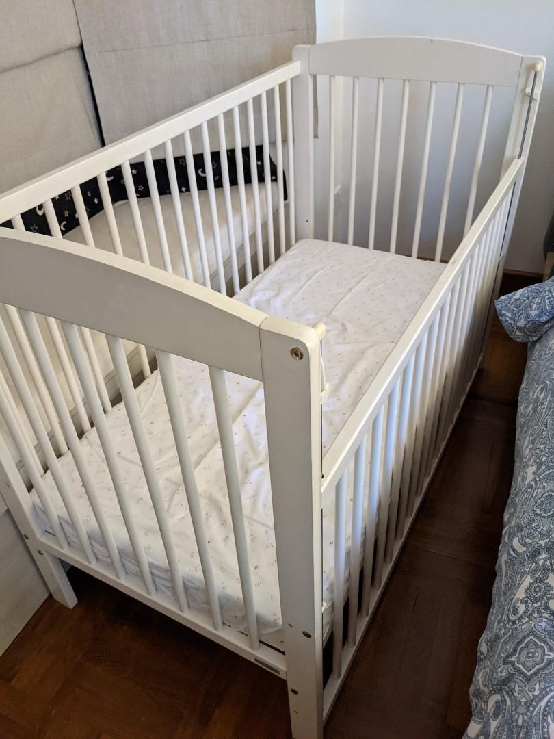 Baby cot with sliding side, Babies & Kids, Baby Nursery & Kids Furniture, Cots & Cribs on Carousell