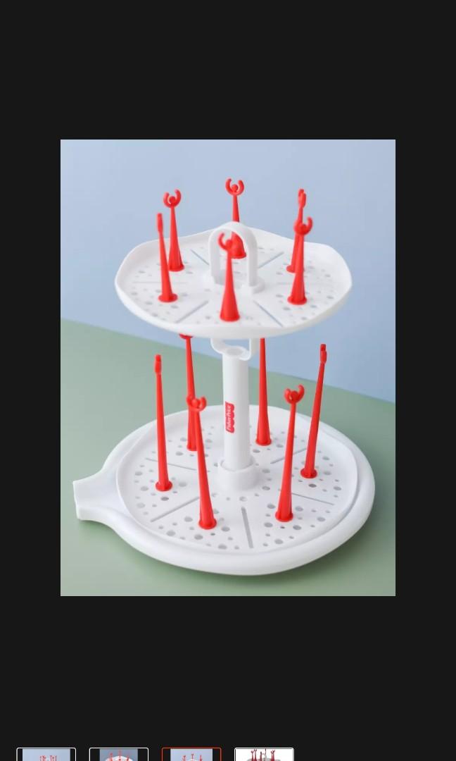 Fisher Price 2 Tier Spinning Drying Rack for Bottles (Category: Breastfeeding & Bottle Feeding) located in Manila. Submitted by sgo713 (Listing ID 1145968241, Image 2). Description: The item is brand new and was bought in Lazada less than a week ago (Feb 23). It was only opened to checked if contents are complete and if it will fit into the space it will be placed on. This has two levels and can be manually spun for easier access. It can hold upt