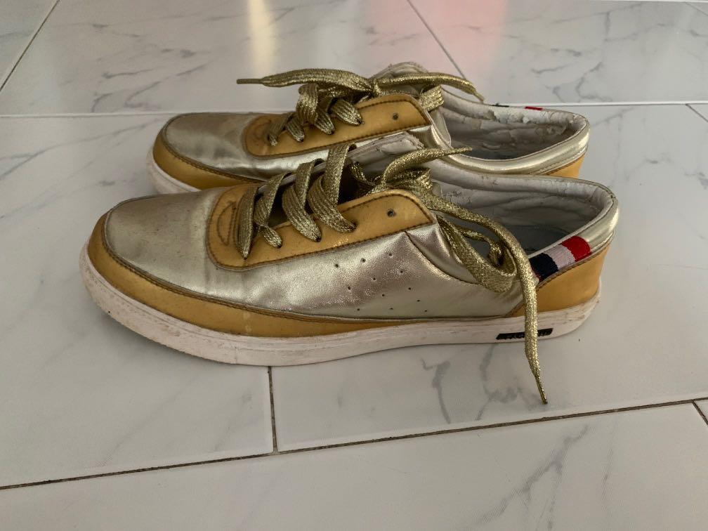 Unique golden white shoes