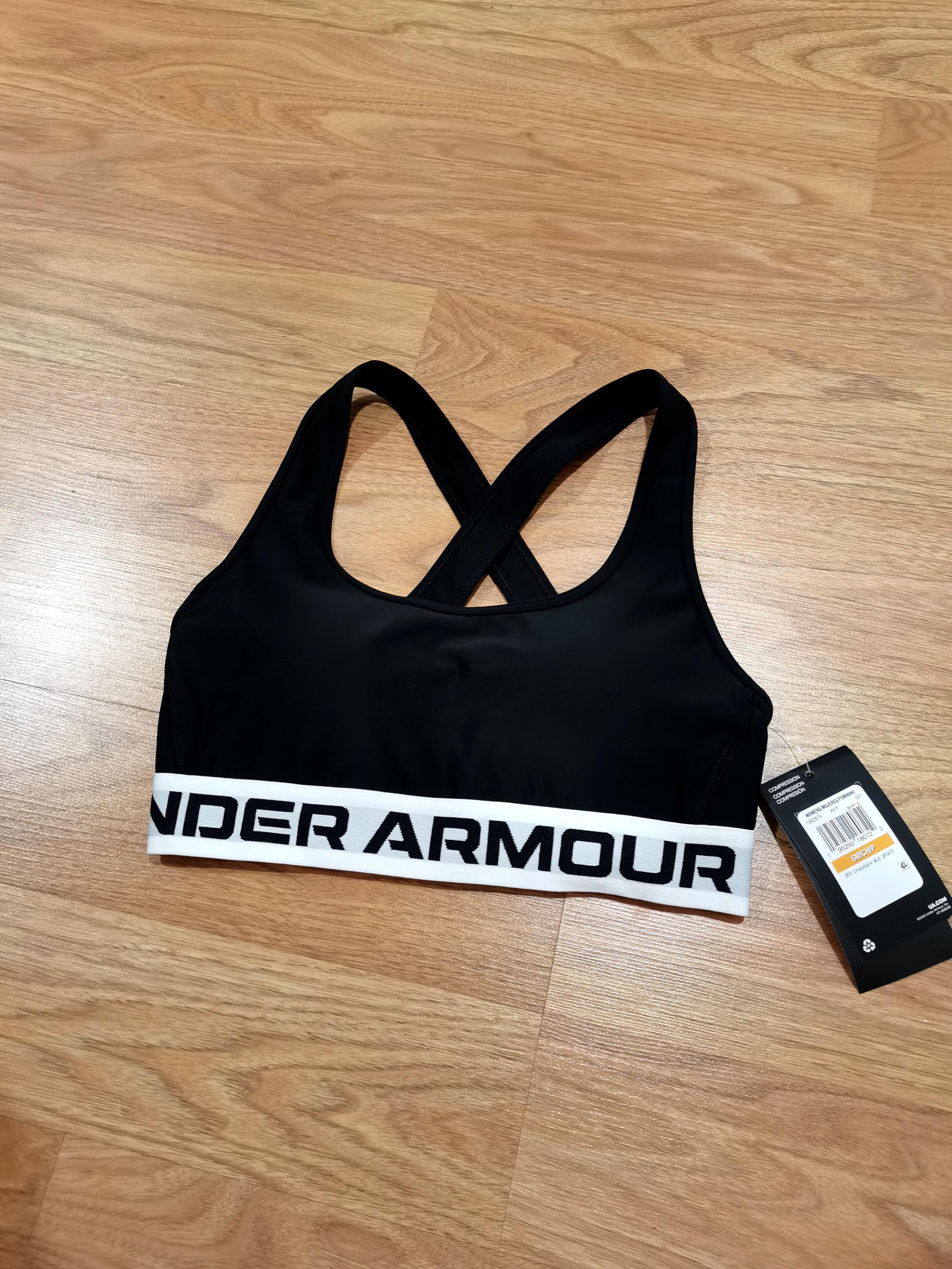 Brand new UNDER ARMOUR sports bra. Size S. Black crossback, stretchable.  Brand new with tag. BNWT, Women's Fashion, Activewear on Carousell