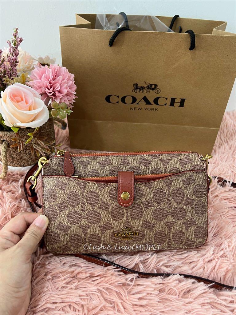Coach Noa Pop up Messenger in Signature Canvas Women s Fashion