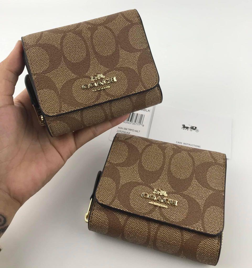 Small trifold wallet in signature canvas store