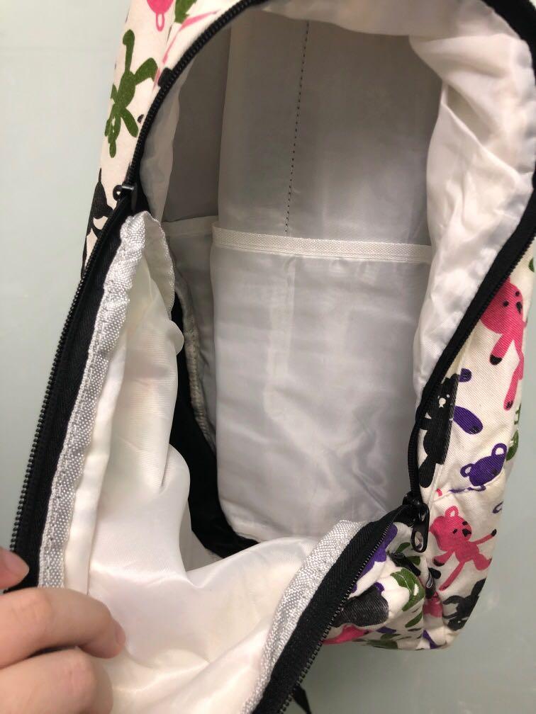back pack (Category: Backpacks) located in Singapore. Submitted by vavecia (Listing ID 1145982816, Image 2). Description: School back pack for kids. No side pocket for bottle. Front pouch. And inner compartment x White turned Abit yellow from discoloration . Can be washed off. .