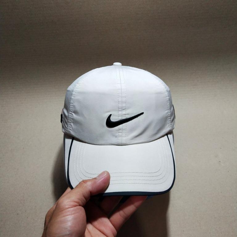 Topi golf nike online