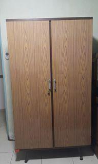 Vintage wardrobe with mirror on inside of door  for sale.