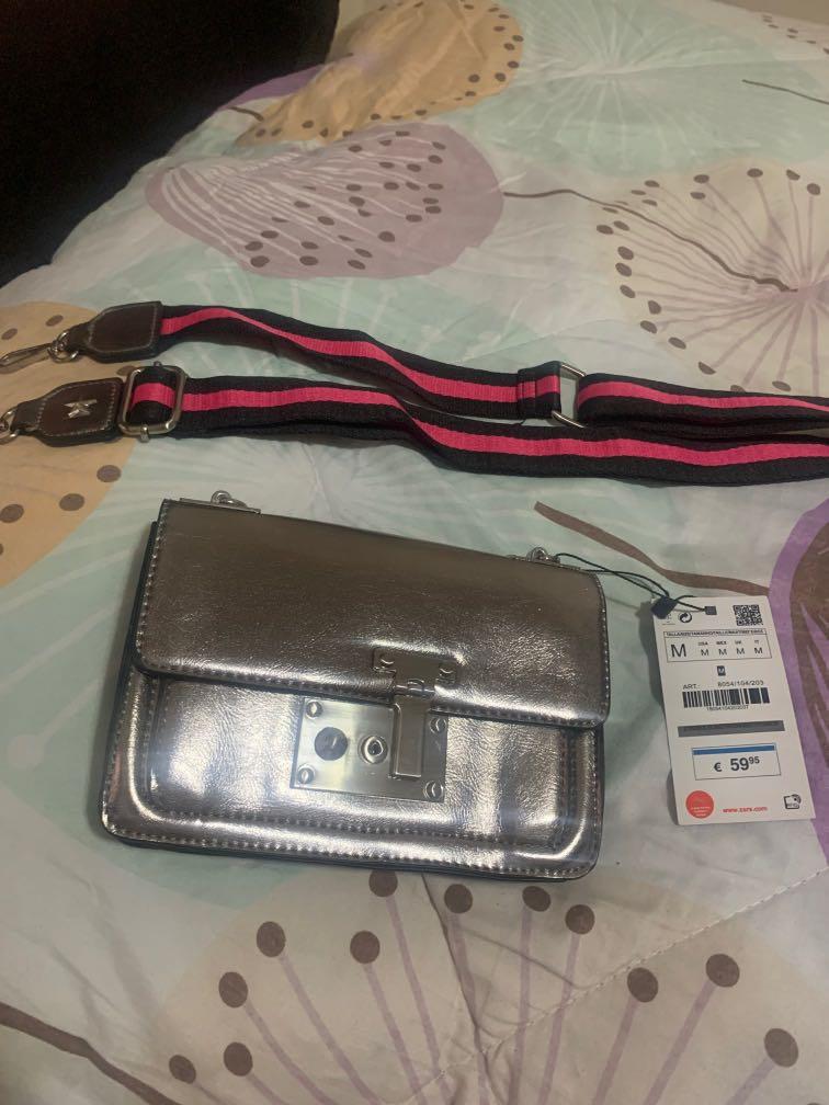 Zara silver bag (Category: Cross-body Bags) located in Quezon City. Submitted by carousel1675 (Listing ID 1141388679, Image 1). Description: This is brand New bought abroad and never got to use it… MOP is Gcash/ BPI/ BDO I can ship via LBC care of buyer.