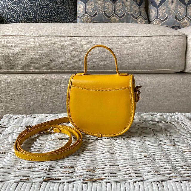 Coach mini top handle saddle bag store