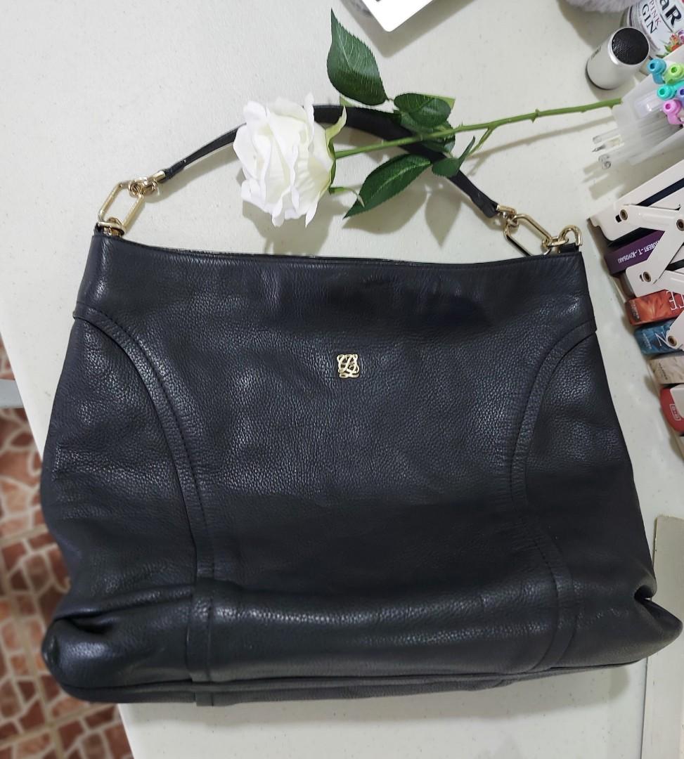 Louis Quatorze (Category: Luxury Bags & Wallets) located in Iligan City. Submitted by maryglenlorenzo (Listing ID 1141652670, Image 1). Description: pure soft leather. medium size hobo bag. no damage, no flaws. pm me pls if interested. thanks..