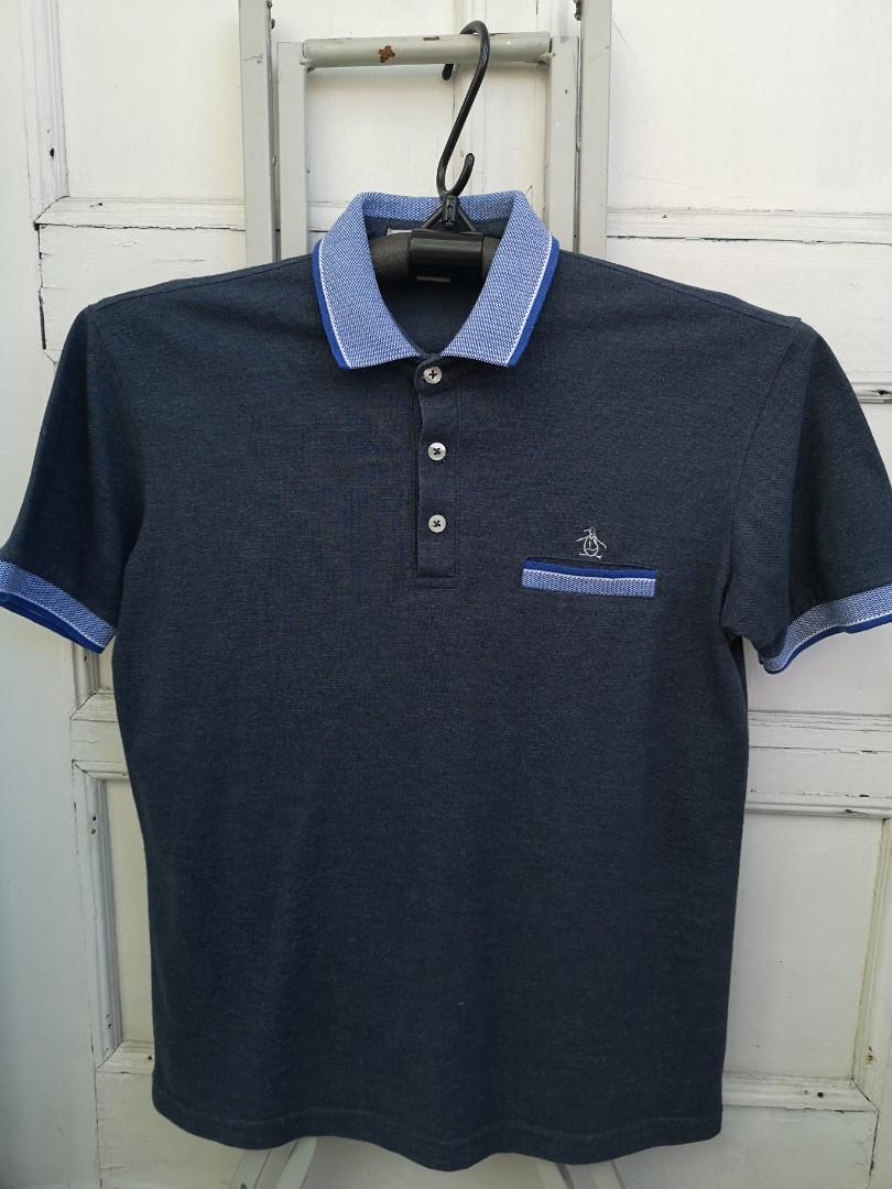 Penguin poloshirt (Category: Tshirts & Polo Shirts ) located in Mandaluyong City. Submitted by japs2 (Listing ID 1141665743, Image 1). Description: Penguin Gray/bluish Tag size:smal W 19 inches L 25 inches Mandaluyong area.