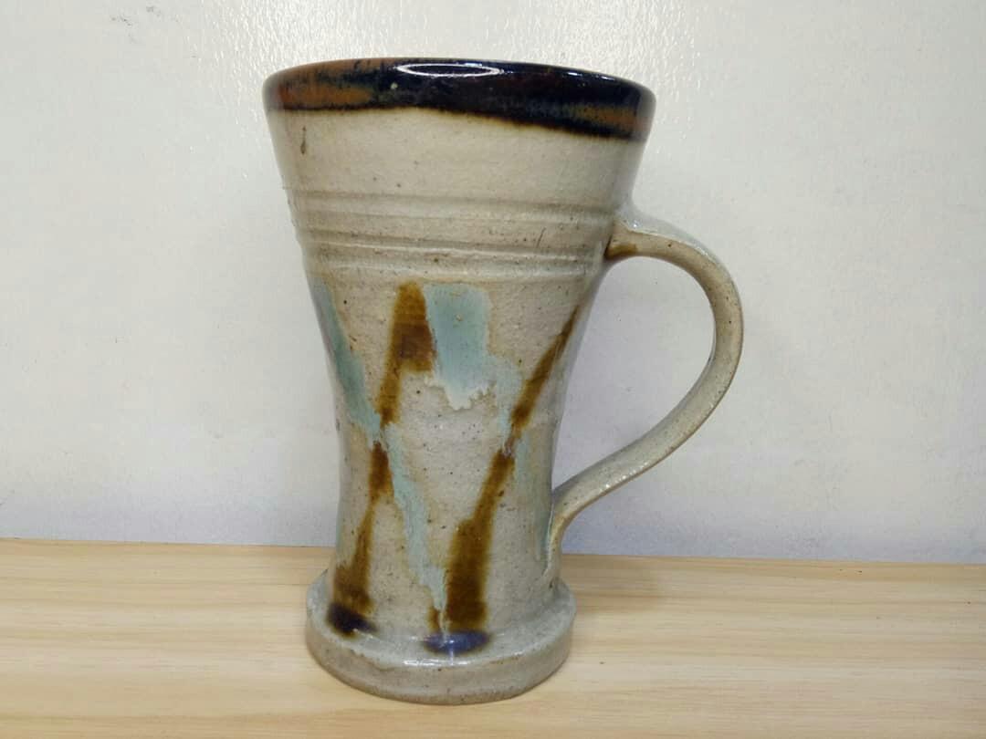 Stoneware tall mug (Category: Other Kitchenware & Tableware) located in Mandaluyong City. Submitted by aishoppe08 (Listing ID 1141616274, Image 1). Description: H15cm x D9.5cm thick and heavy.