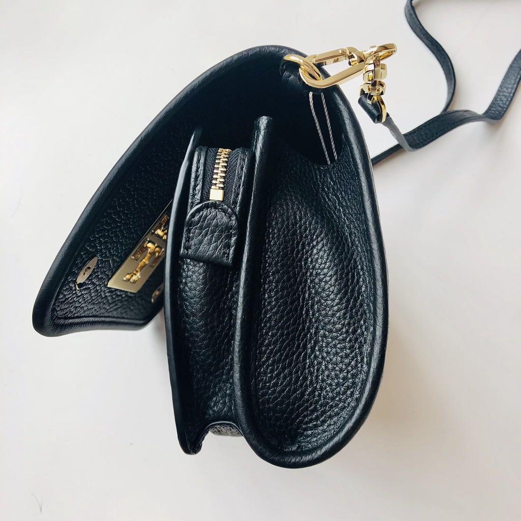 Mcgraw round crossbody tory burch top