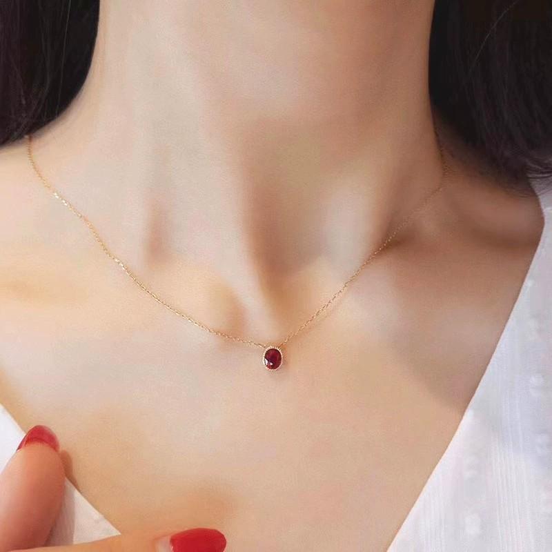 Gold chain with red new arrivals ruby
