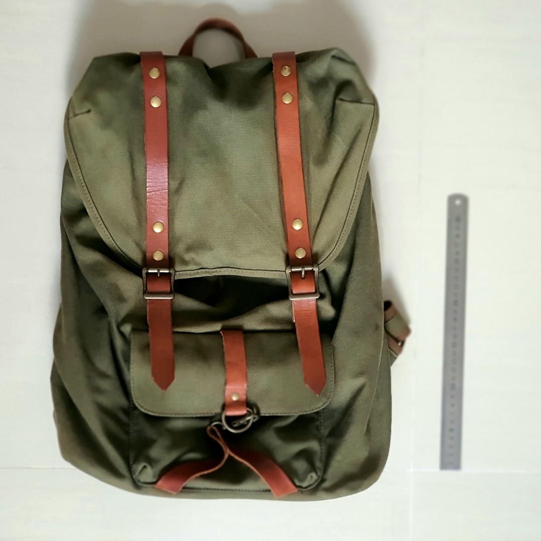 Green canvas backpack hotsell with leather straps