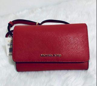 authentic mk phone sling wallet in scarlet