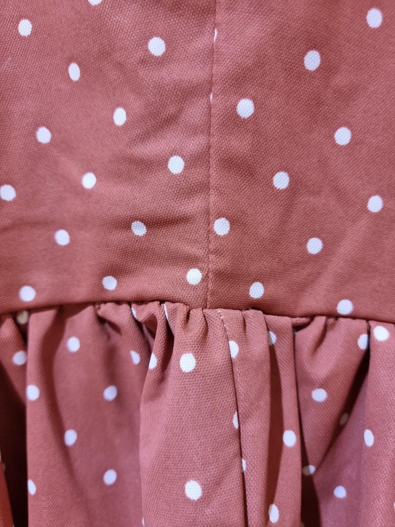 Polka Dot Tie Strap Blouse (Category: Sleeveless) located in Manila. Submitted by decluttermystuff21 (Listing ID 1141762539, Image 3). Description: Salmon Polka Dot Tie Strap Top Brand: No Brand Size: Free size, best fits medium frame and fabric is stretchy Condition: Used but in very good condition. No flaws..