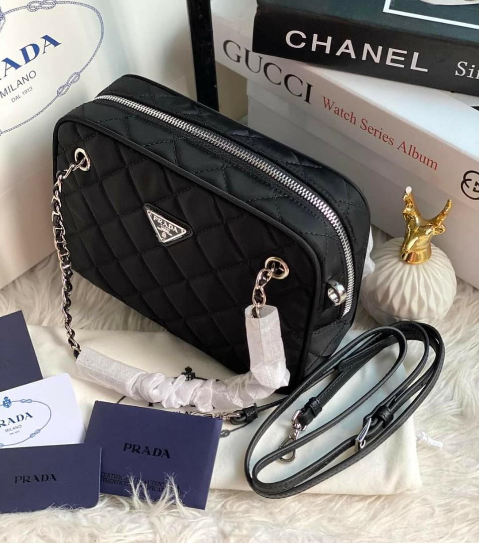 Prada black nylon camera bag (Category: Luxury Bags & Wallets) located in Santa Cruz. Submitted by janelovebagswatchesshoesph (Listing ID 1141713847, Image 3). Description: with tag, paper bag, dust bag and authenticity cards.