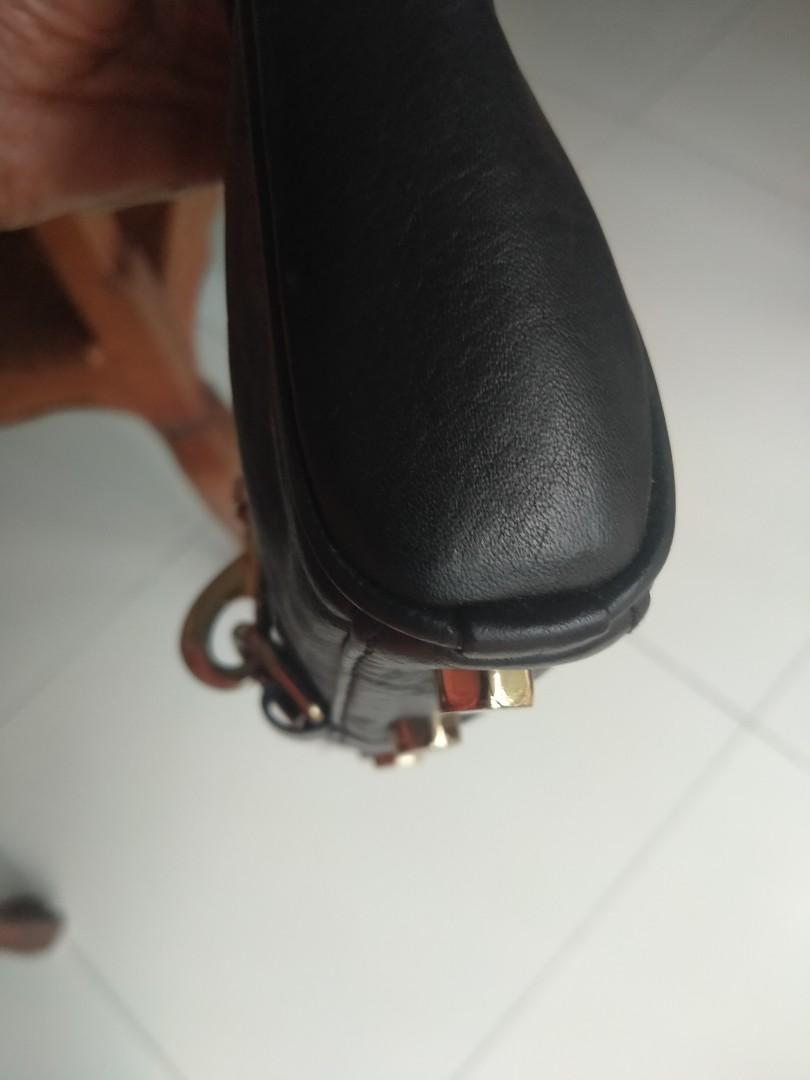 Rebecca Minkoff black small sling bag (Category: Cross-body Bags) located in Muntinlupa City. Submitted by cassava_ph (Listing ID 1141789071, Image 3). Description: Adjustable crossbody or chest bag. Aside from hardware fadings, there are no flaws. Original RM strap..